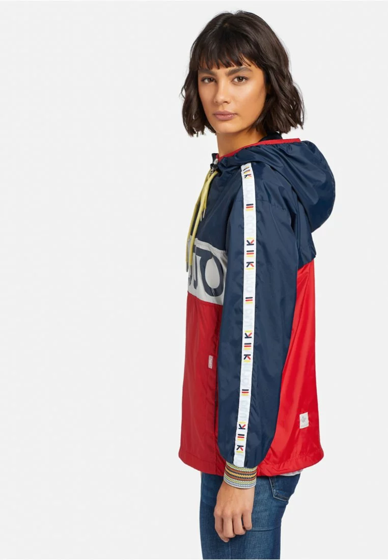 Khujo ELIANA - Cortaviento - Blue/white/red, Mujer 4 Khujo ELIANA - Cortaviento - Blue/white/red, Mujer - Imagen 4